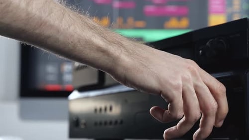 Young Man in Sound Recording Studio