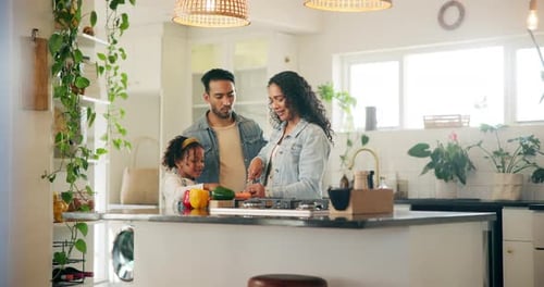 Happy Family Preparing Food Together in Kitchen