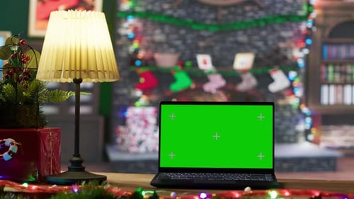 Colorful Decorated Empty Workshop with Isolated Mockup Screen on a Laptop