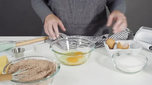 Cracking Eggs for Baking at Home