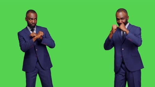 Male Entrepreneur Preparing to Box and Fight in Studio