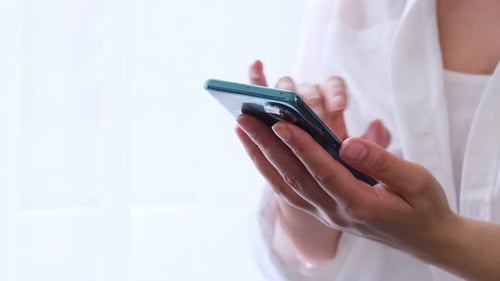 Close Up Video Woman Using Mobile Phone Lady Use of Cellphone at Home Unrecognizable Woman Playing