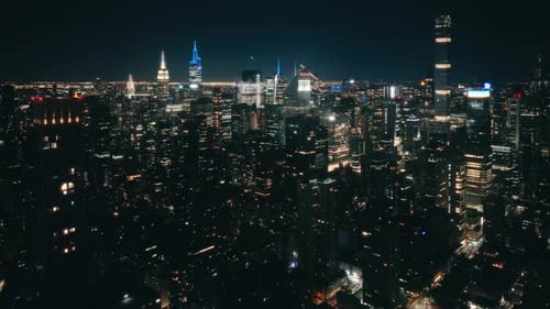 Aerial Flight Over NYC Downtown Illuminated at Night Night Traffic Aerial USA