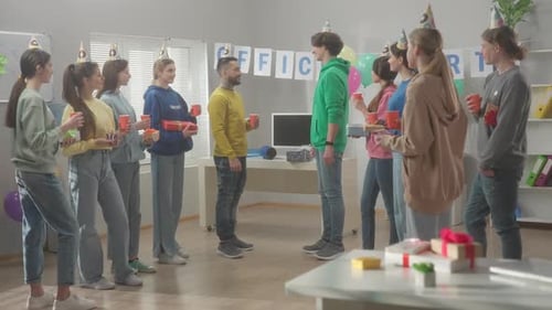 Colleagues Celebrate Birthday in Modern Office