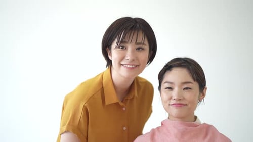 Make-up Artist Applying Foundation on Model's Face