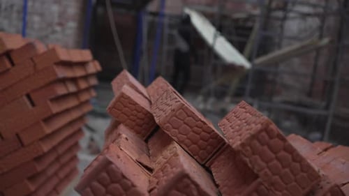 Stacked Bricks Form Orderly Composition in Abandoned House