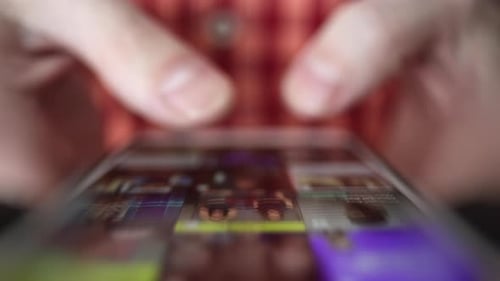 Hands Scrolling on Phone Social Media Technology