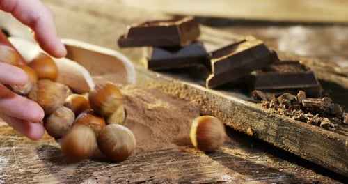 Hazelnuts and Chocolate Squares Still Life