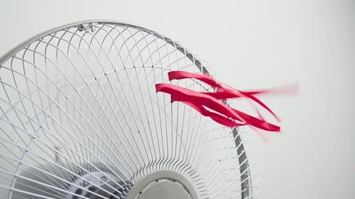 Closeup view of electric fan on a hot day