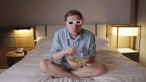 Man Watches 3D Movie, Eats Cereal in Bed