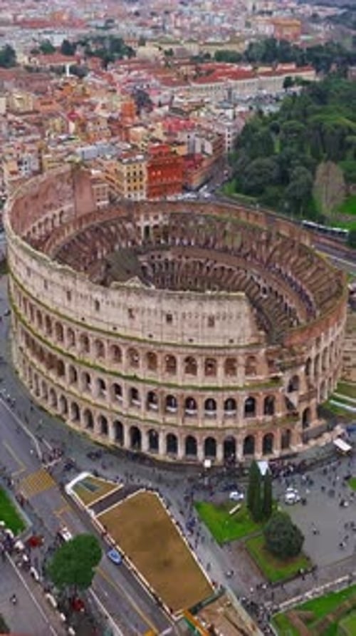 Establishing Shot Drone Flying of the Colosseum Famous Ancient Roman Arena Downtown Rome Italy The
