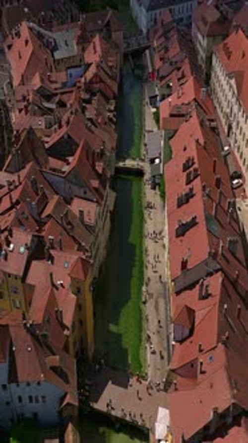 Old Town Center of Annecy and the River Thiou with Tourists Visiting An Emblematic River of Annecy