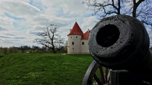 Old cannon medieval defense system cast iron, Bauska Castle Latvia