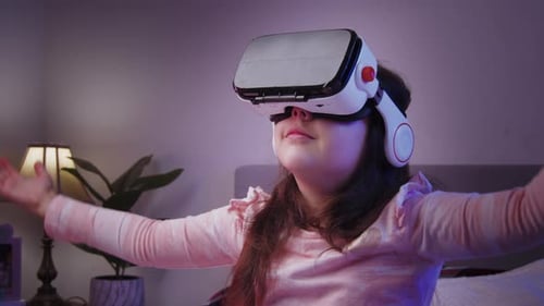 NeonLit VR Girl Gamer Enjoying Virtual Reality In Studio