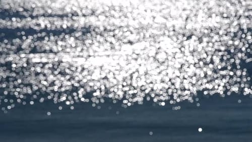 Sunlight Glimmering on Out of Focus Ocean Water