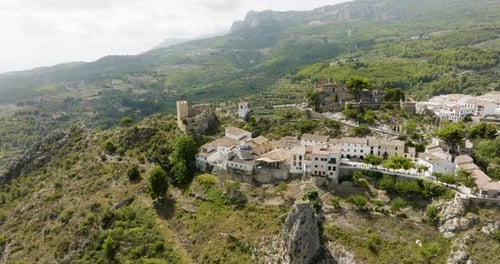 Panning Aerial Shot Of Mountain Town In Spain Busy Tourist Attraction