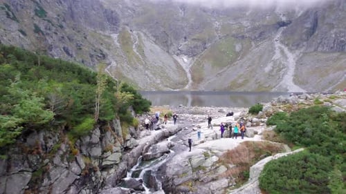 hiking climb high mountain hard steep climb waterfall mountain lake