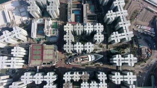 Aerial view of Hong Kong Whampoa buildings and unique Cruise Ship shaped shopping mall.