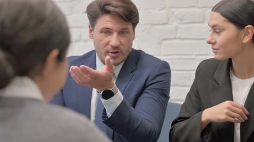 Close up of Businessman Talking with Business Partners