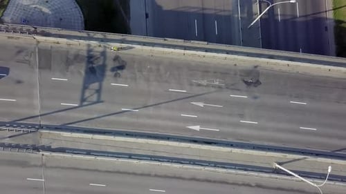 A Breathtaking Aerial View Showcasing the Urban Highway Traffic in a Bustling Metropolis Stock Clip
