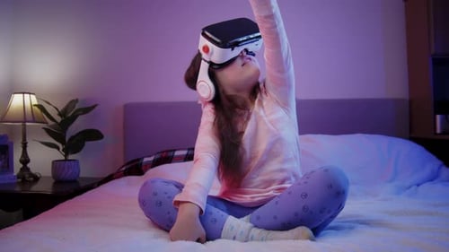 Child Experiencing Virtual Reality Headset at Home