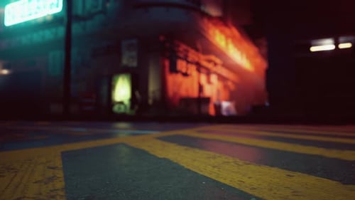 A Bustling City Street Illuminated By Neon Lights at Night