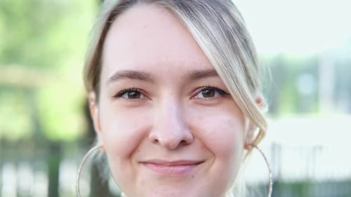 Woman Smiling and Sticking Tongue Out, Close Up