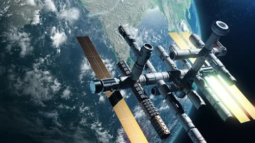the space station in orbit of the earth. the concept of exploring the world and modern technology