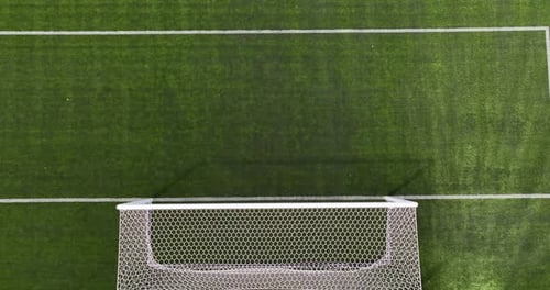 Aerial View of Soccer Goal on Grass Field With Perfectly Cut Turf