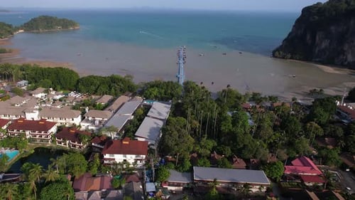 Drone Shot of East Railay Beach, Krabi Thailand. Buildings and Pier in Bay