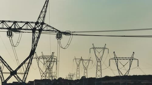Transmission Power Line Tower on field