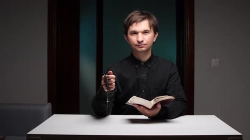 Man With Rosary and Book