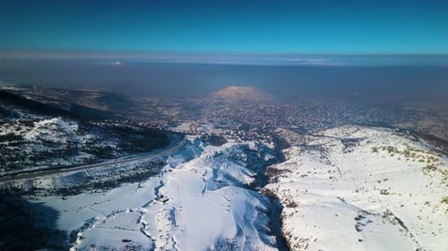 Snowy Mountains Aerial View in Winter Landscape