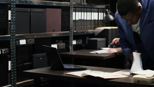 Business Professional Reviews Documents in Office