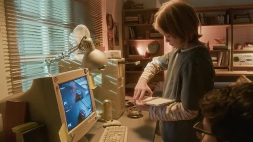 Children Playing Retro Car Game on Vintage Computer