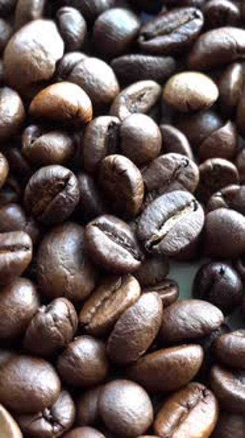 Pile of Roasted Coffee Beans Close Up