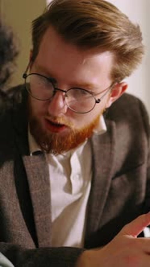 Team Collaborating on Charts and Graphs During Meeting