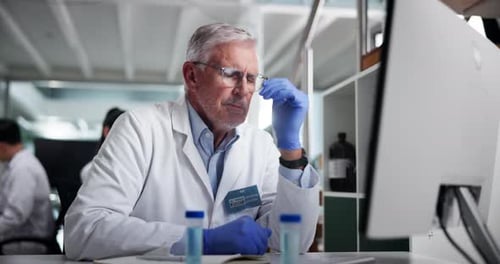 Pensive Scientist Working in Bright Laboratory Setting