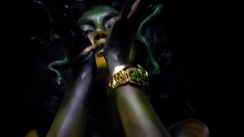 Model with Medusa Makeup and Snakes in Hair