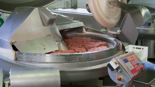 Rotating Cutter Mincer Machine Equipment Processing Mincemeat on Meat Plant