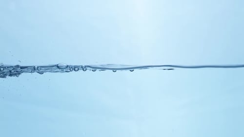 Liquid Ripple Effect in Blue Water. View of Nature's Smooth Fluid Patterns.