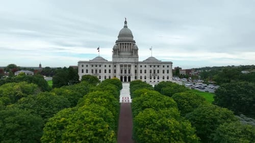 Rising drone shot of state Capitol building in Providence, Rhode Island. Grand marble government bui