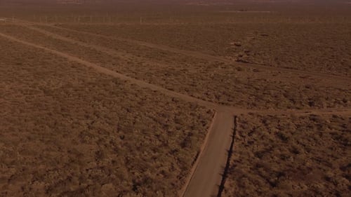 Aerial View of Desert Crossroads in Warm Afternoon Light