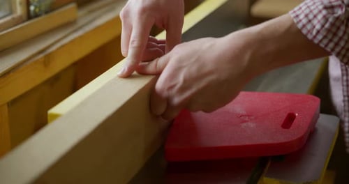 Artisan Smoothing Wood on Carpentry Machine