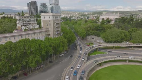 Drone shot of downtown Los Angeles in Georgia. Traffic on American roads.