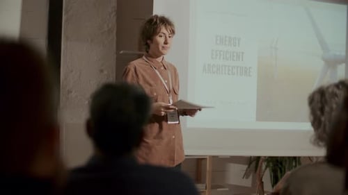 Presenter Discusses Energy Efficient Architecture with Audience