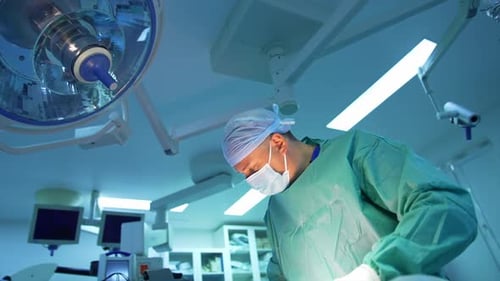 Plastic surgery in modern hospital operating room.