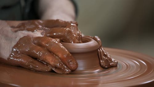 Working With Clay In Ceramic Workshop 16