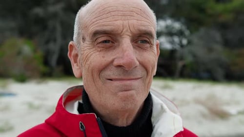 Senior Man Smiling on Beach Close-Up