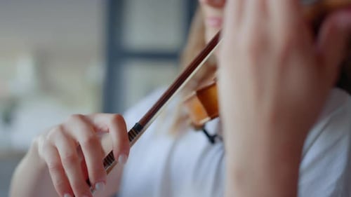 Woman Plays Violin Bow Close Up Indoors